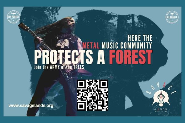 Sign showing the first metal forest preserved area. Andreas Kisser being displayed as a support in front of the text describing a protected area.